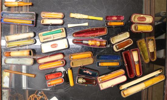A collection of 38 cigarette and cheroot holders,